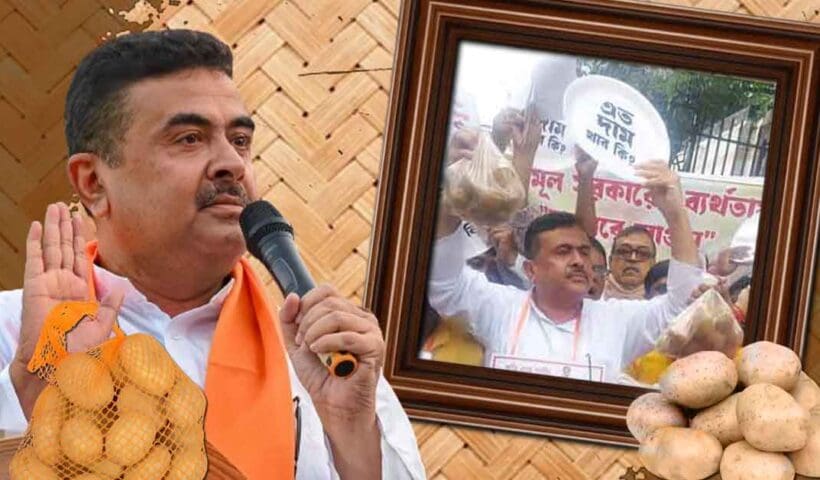 Photo of Suvendu Adhikari, an Indian politician, sitting on a street or road, surrounded by protesters or supporters, holding a placard or sign, engaged in a protest or demonstration, likely related to a social or political issue.