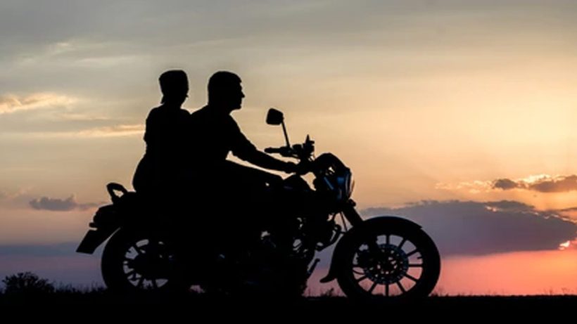 Lover's wife behind the bike