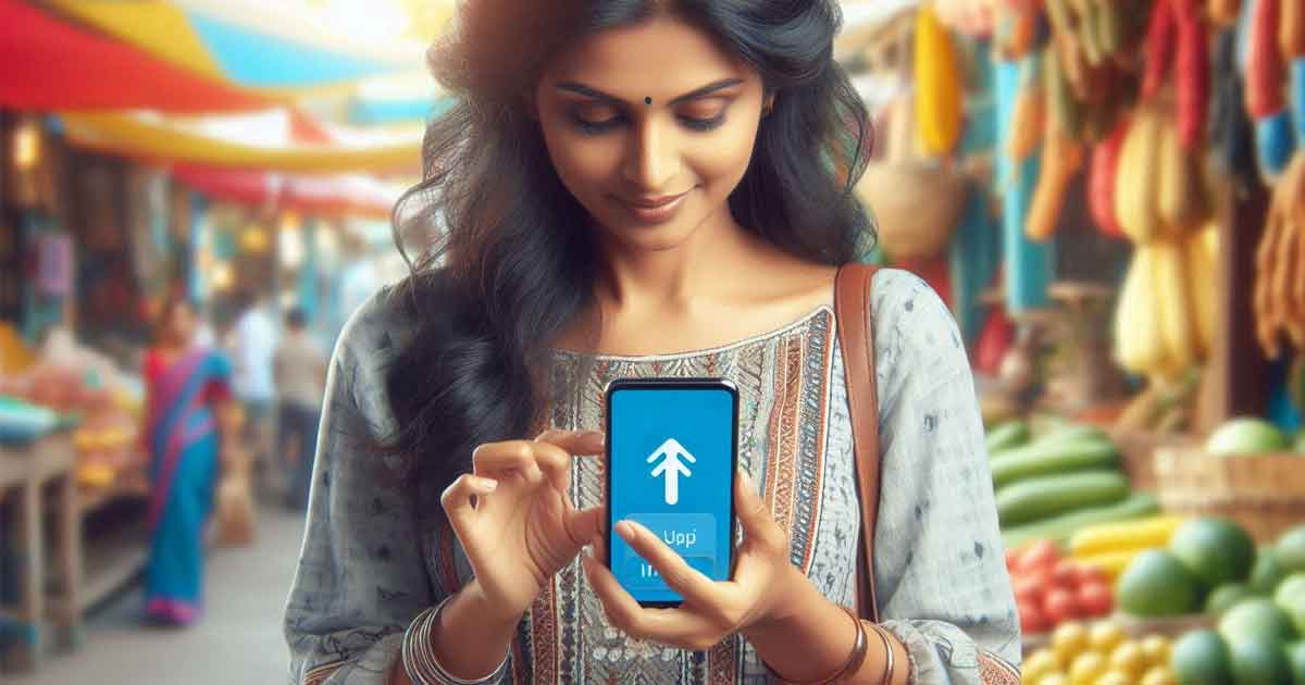 An Indian woman is using her smartphone to make a digital payment using the UPI system in India. The background is a bright and colorful marketplace