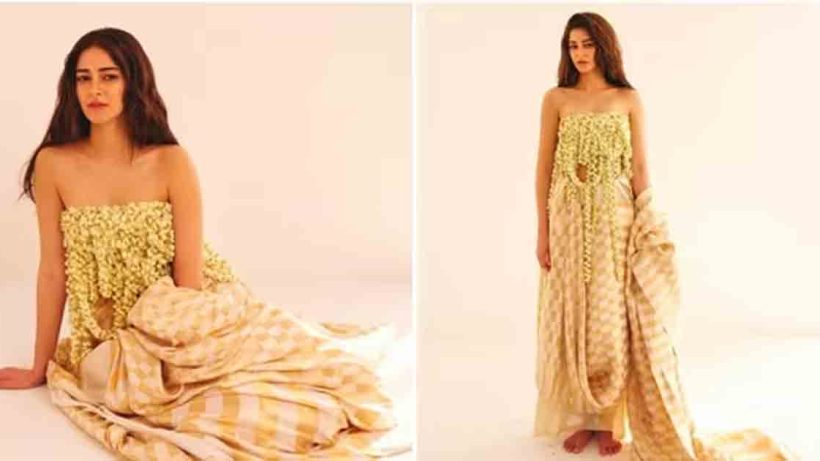 Ananya Panday stuns with a bold and modern twist on the traditional saree. Ditching the blouse, she wraps herself in a floral arrangement, creating a unique and glamorous look. Check out her striking photoshoot!