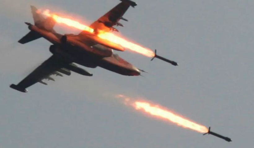 Fighter jet shooting missiles