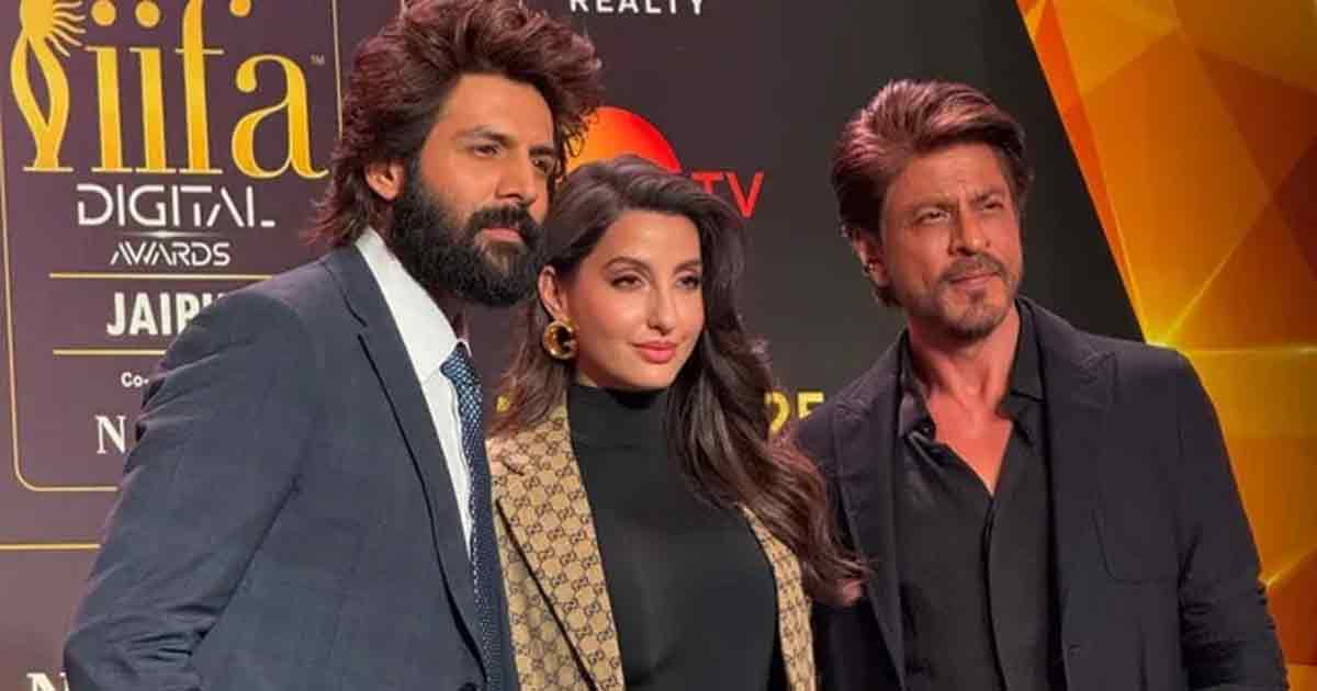 "Shah Rukh Khan shares hosting tips with Kartik Aaryan at the IIFA 2025 pre-event in Mumbai. The duo sets the stage for the upcoming awards with a fun and memorable moment."