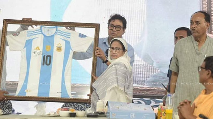 Chief Minister Mamata Banerjee with Lionel Messi signature jersey