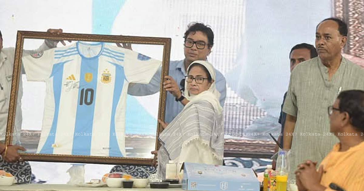 Chief Minister Mamata Banerjee with Lionel Messi signature jersey