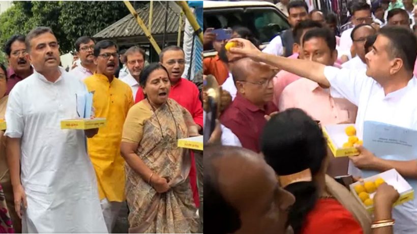 bjp mlas distribute laddus in assembly