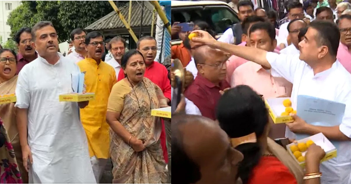 bjp mlas distribute laddus in assembly