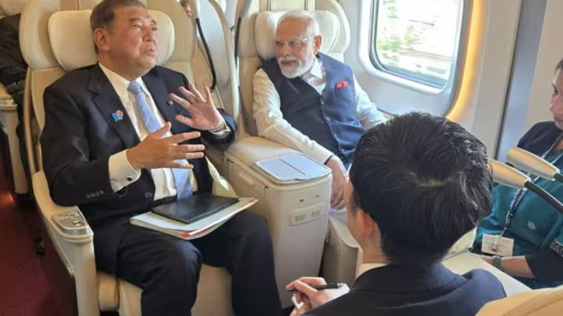 modi rides bullet train in japan