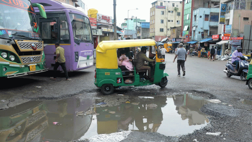 Auto-Rickshaw Overturns on Bengaluru Pothole-Ridden Streets