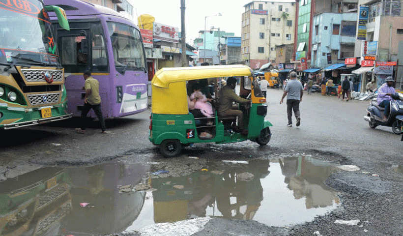 Auto-Rickshaw Overturns on Bengaluru Pothole-Ridden Streets