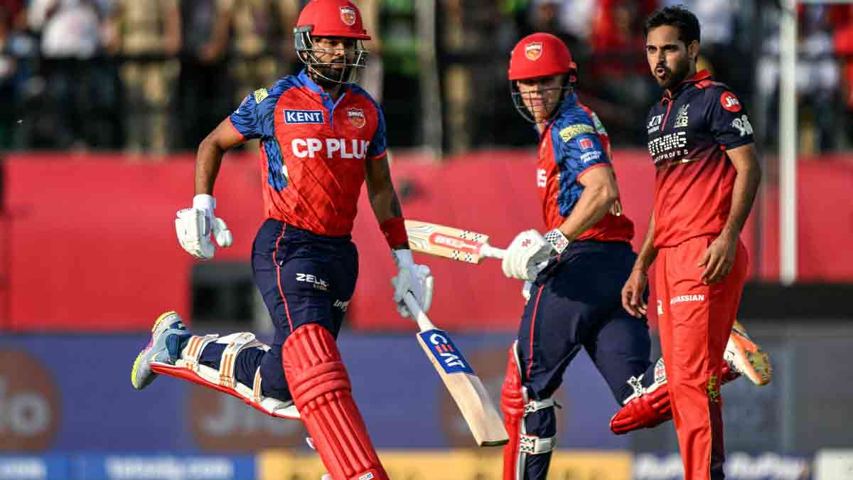 rcb-beat-punjab-to-reach-playoffs-kohli-title-dream